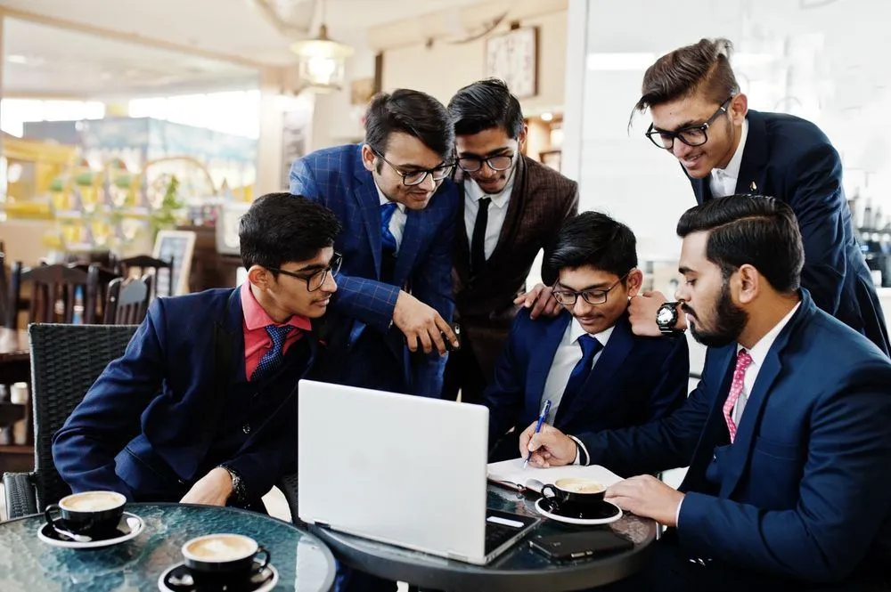 Group of young delegates collaborating
